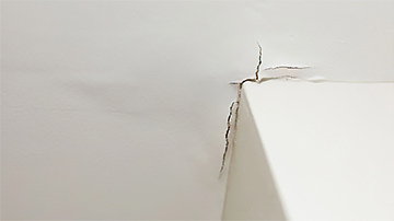 plaster water damage cracks repair near me